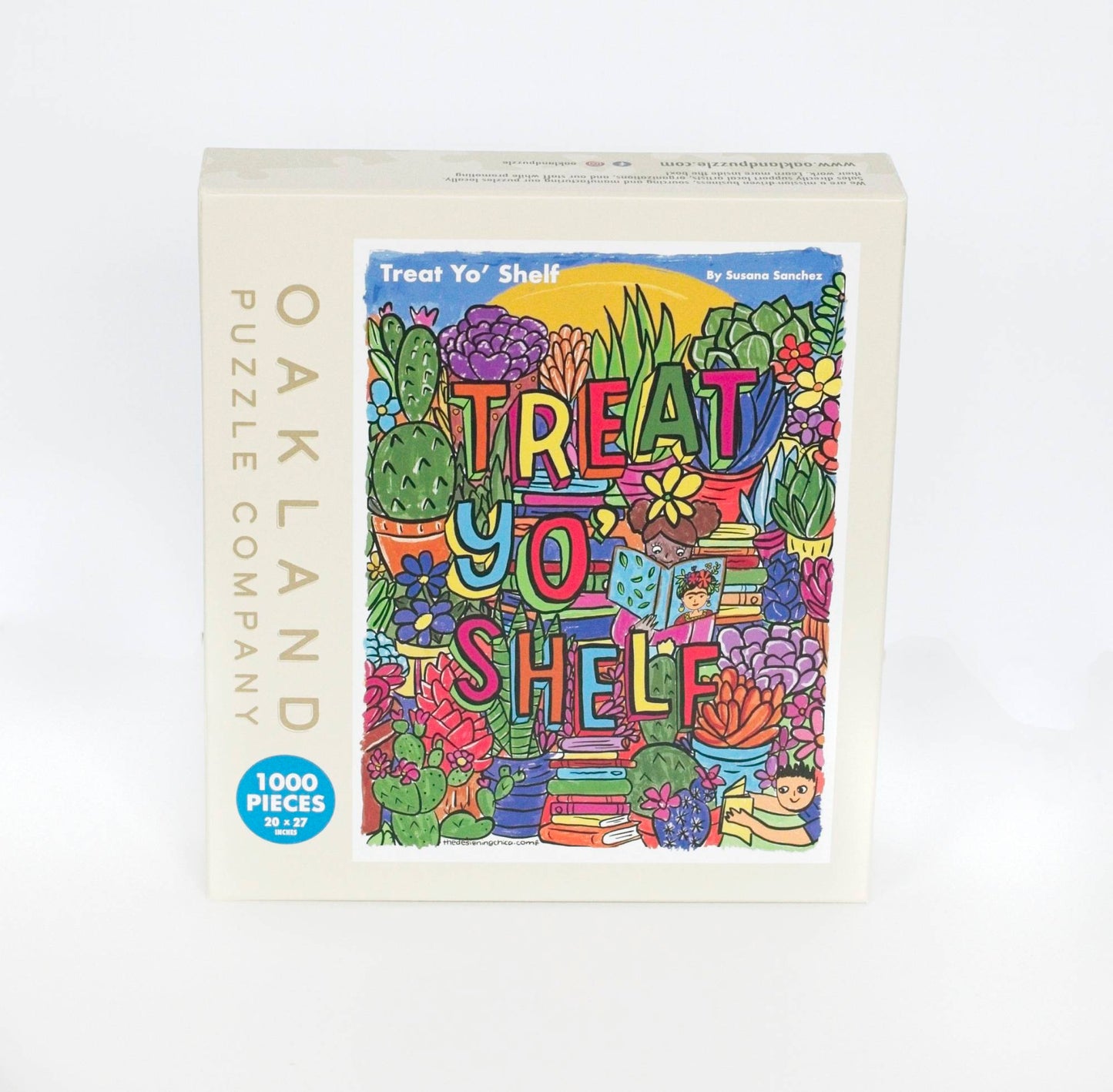 A photo of a beige box branded Oakland Puzzle Company with the Text Treat Yo' Shelf by Susana Sanchez at the top and 1000 Pieces 20x27 inches in a blue circle in the corner. The box features a brightly colored whimsical image.