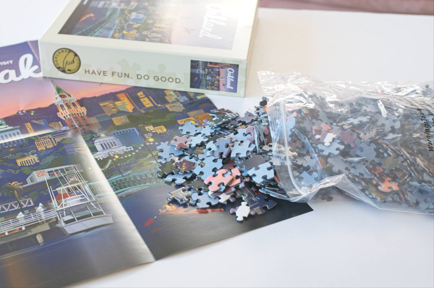 Puzzle with pieces and packaging on a table