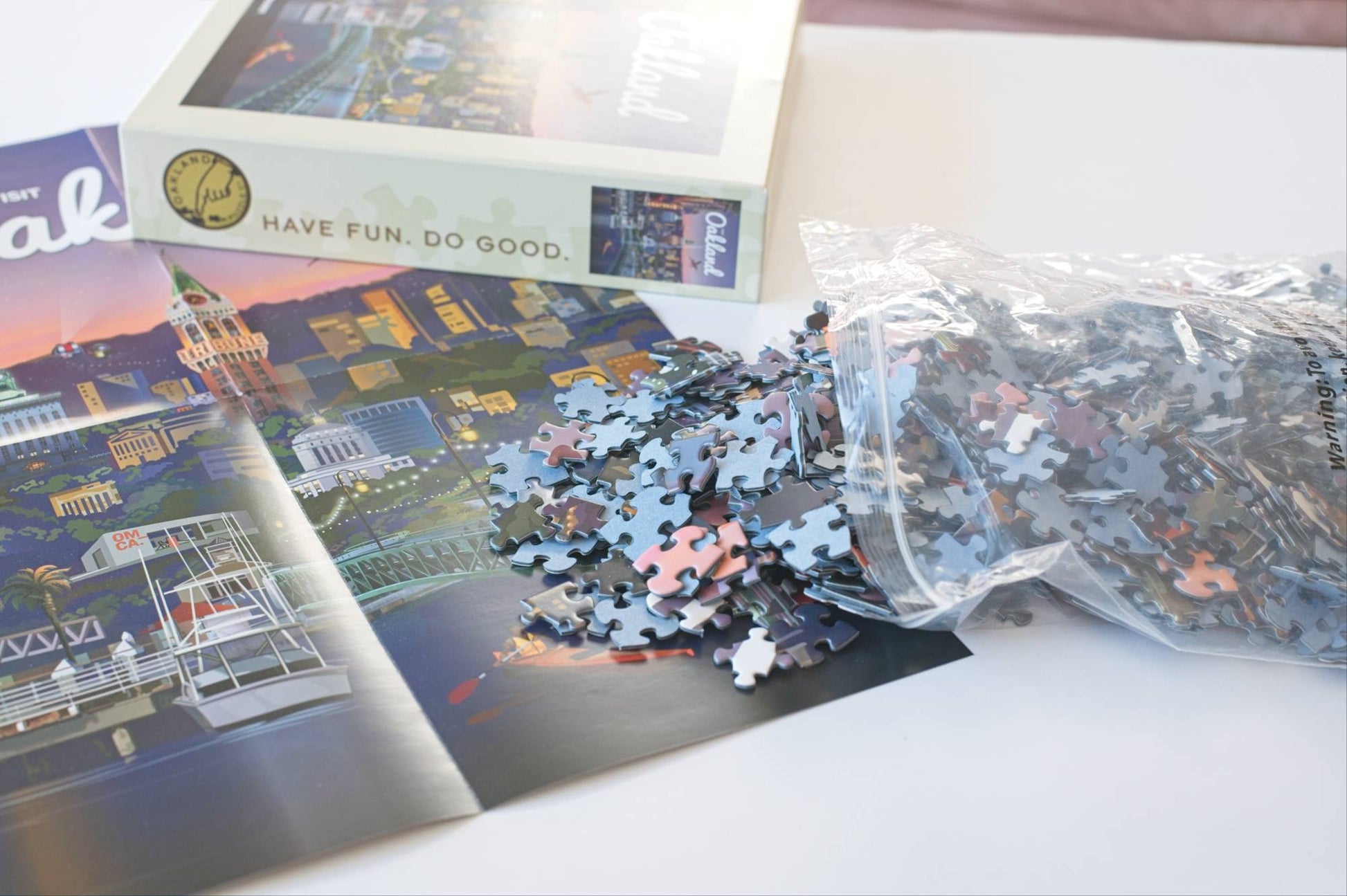 Puzzle with pieces and packaging on a table
