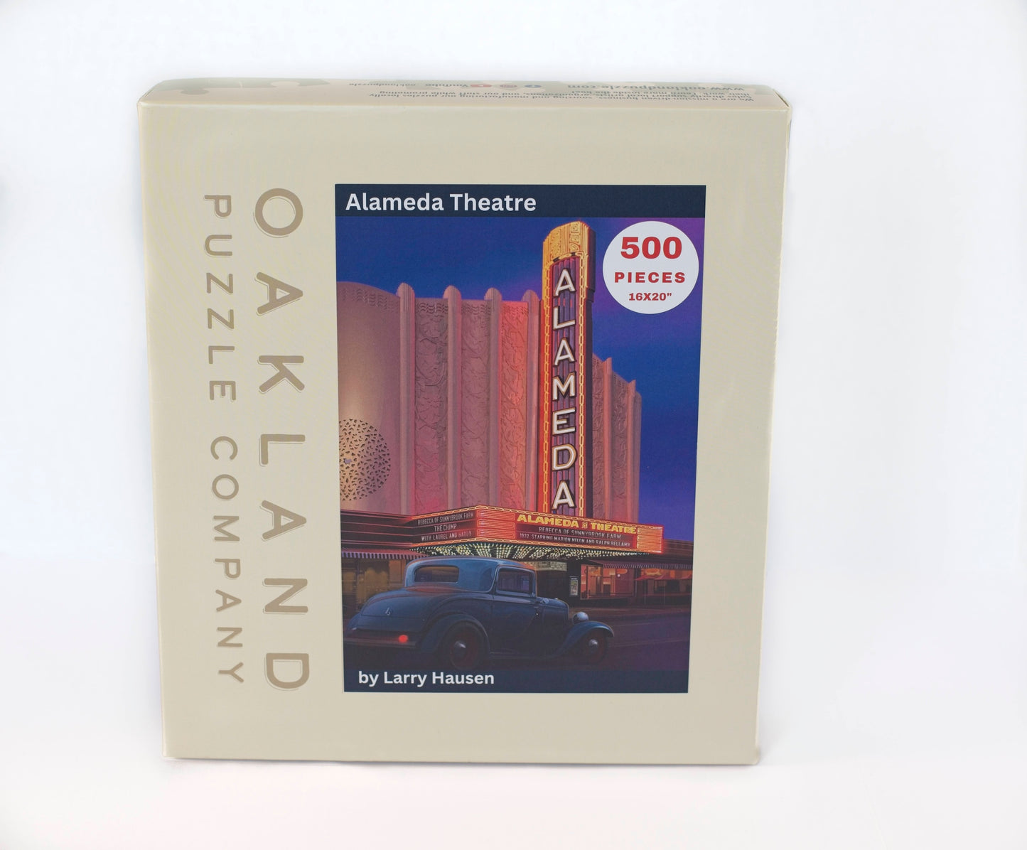 A box branded Oakland Puzzle Company showing the illustrated image of the Alameda Theater. Box sayd 500 pieces 16x20"