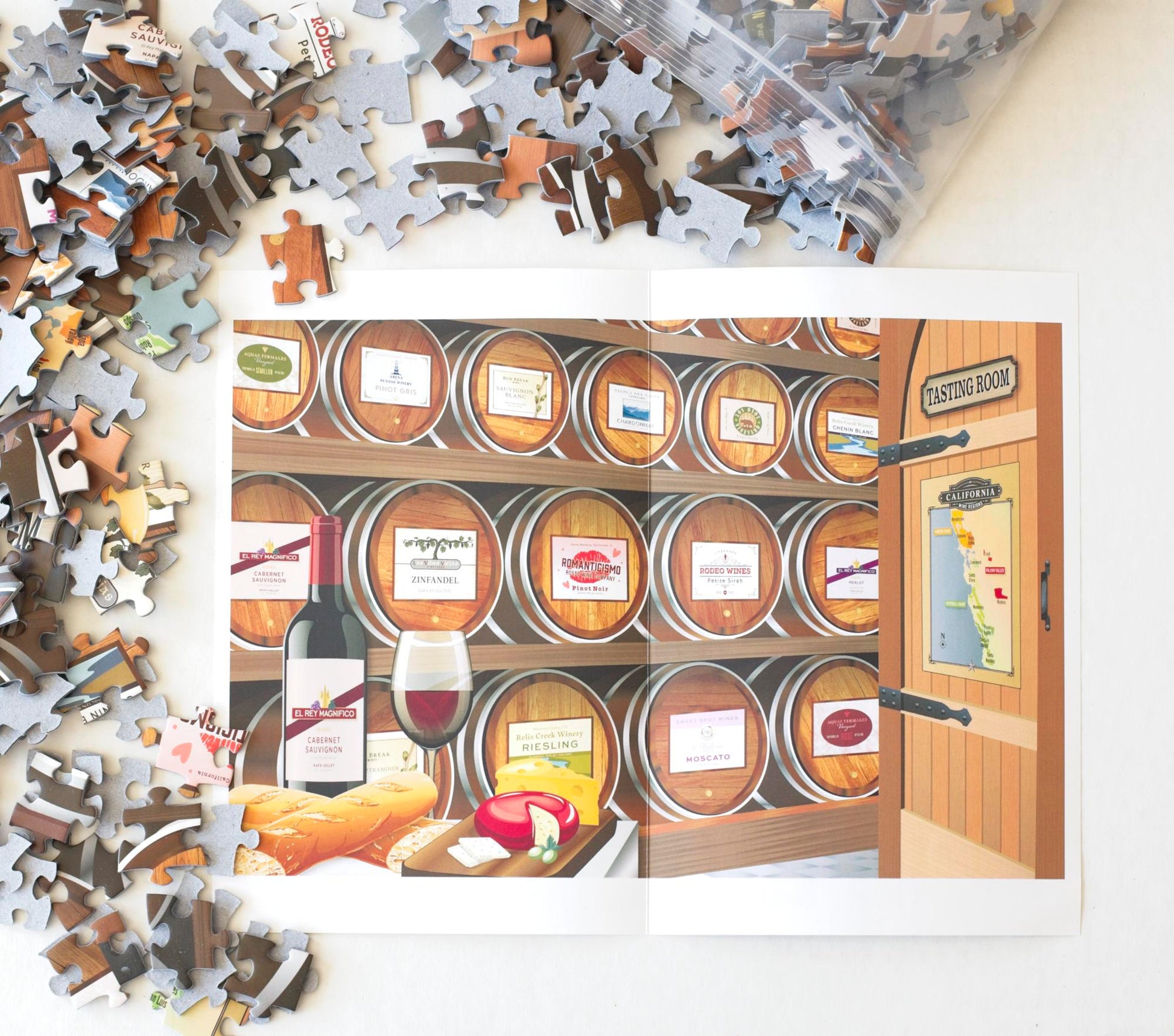 A poster of the California Wine Tasting image surrounded by puzzle pieces spilling from a resealable plastic bag.