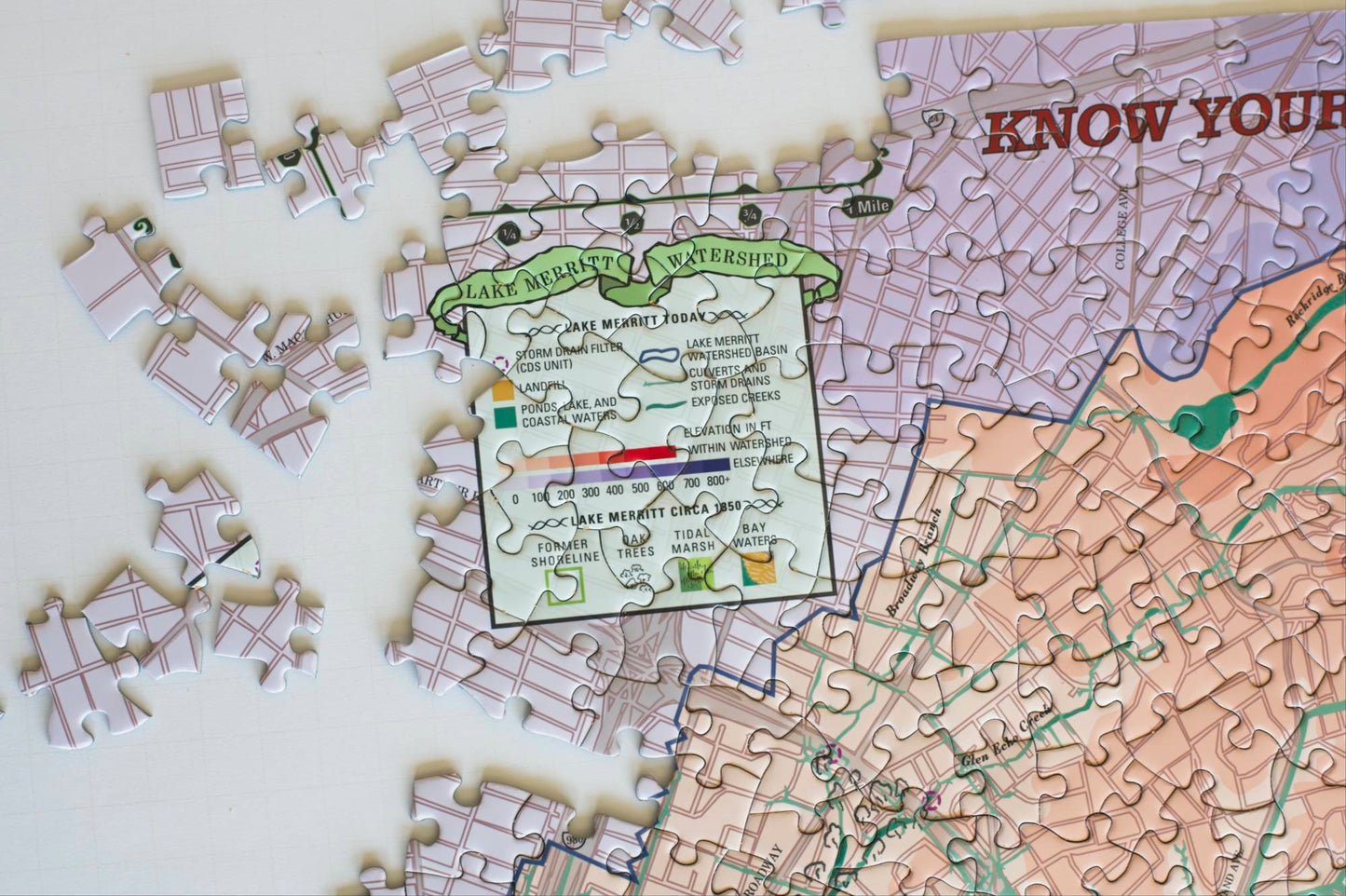 A close up of the partially completed puzzle showing the map key titled Lake Merritt today and Lake Merritt Circa 1850