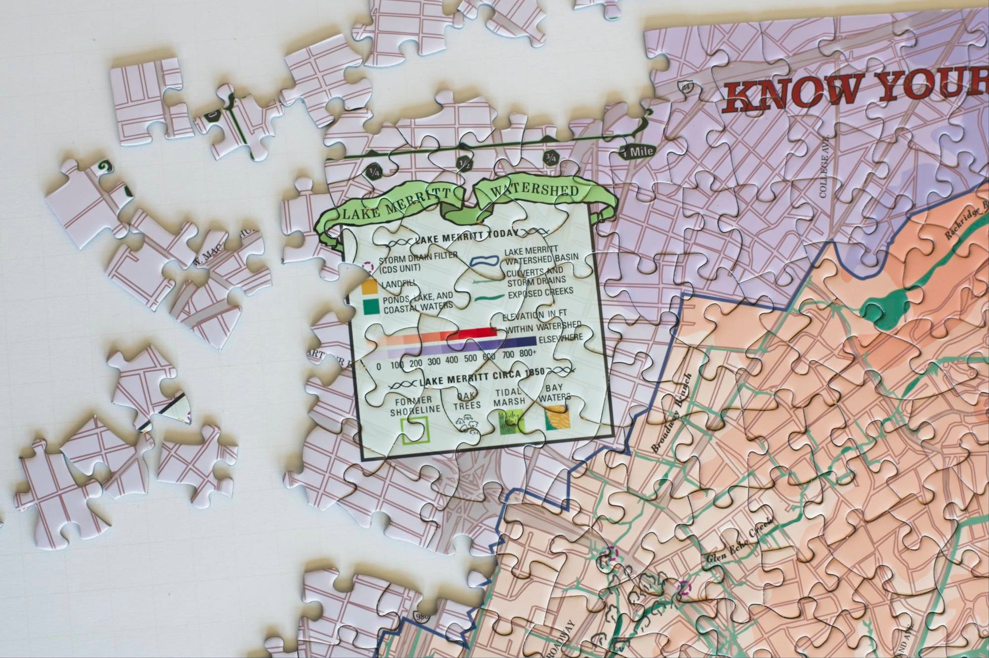 A close up of the partially completed puzzle showing the map key titled Lake Merritt today and Lake Merritt Circa 1850