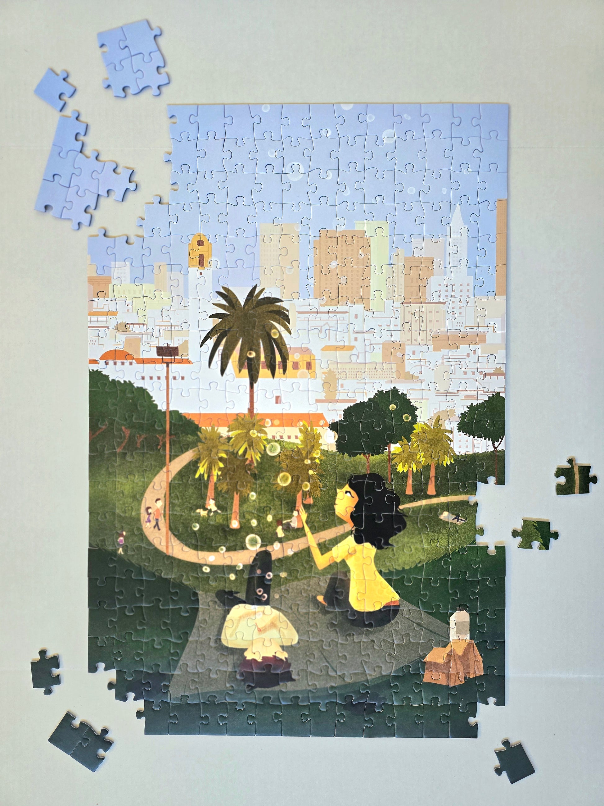 300-piece completed jigsaw puzzle featuring the Simple Pleasures at Dolores Park design