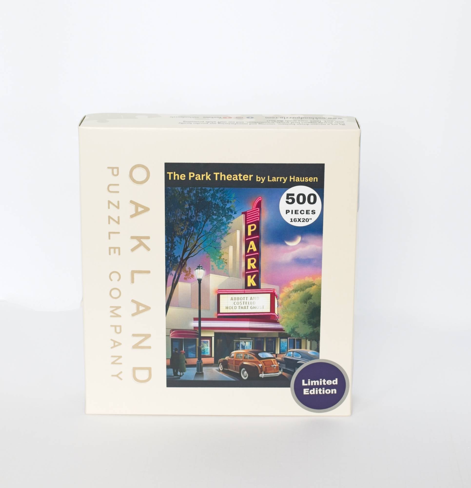 Jigsaw puzzle box featuring 'The Park Theater' by Larry Hausen with Oakland Puzzle Company branding.