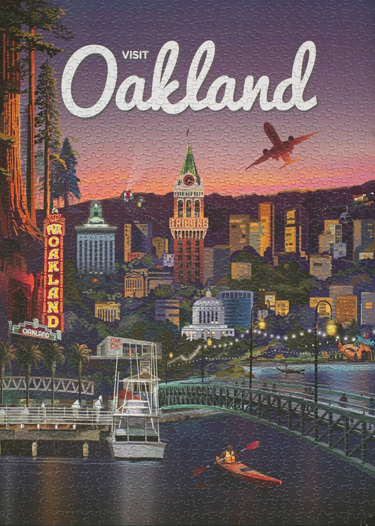 A completed jigsaw puzzle with an mage designed as a promotional poster for Visit Oakland with city skyline and waterfront at sunset.