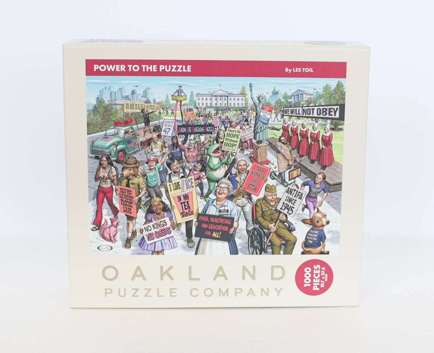 Oakland Puzzle Company puzzle box with a colorful illustration of protesters and text.