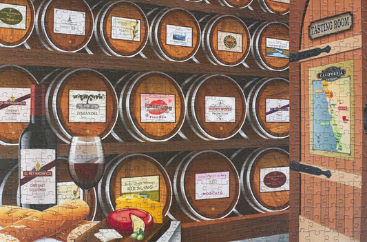 A completed jigsaw puzzle showing a wine tasting room with wine barrels that have various colorful labels. There is a map of California with areas of marked on the door.