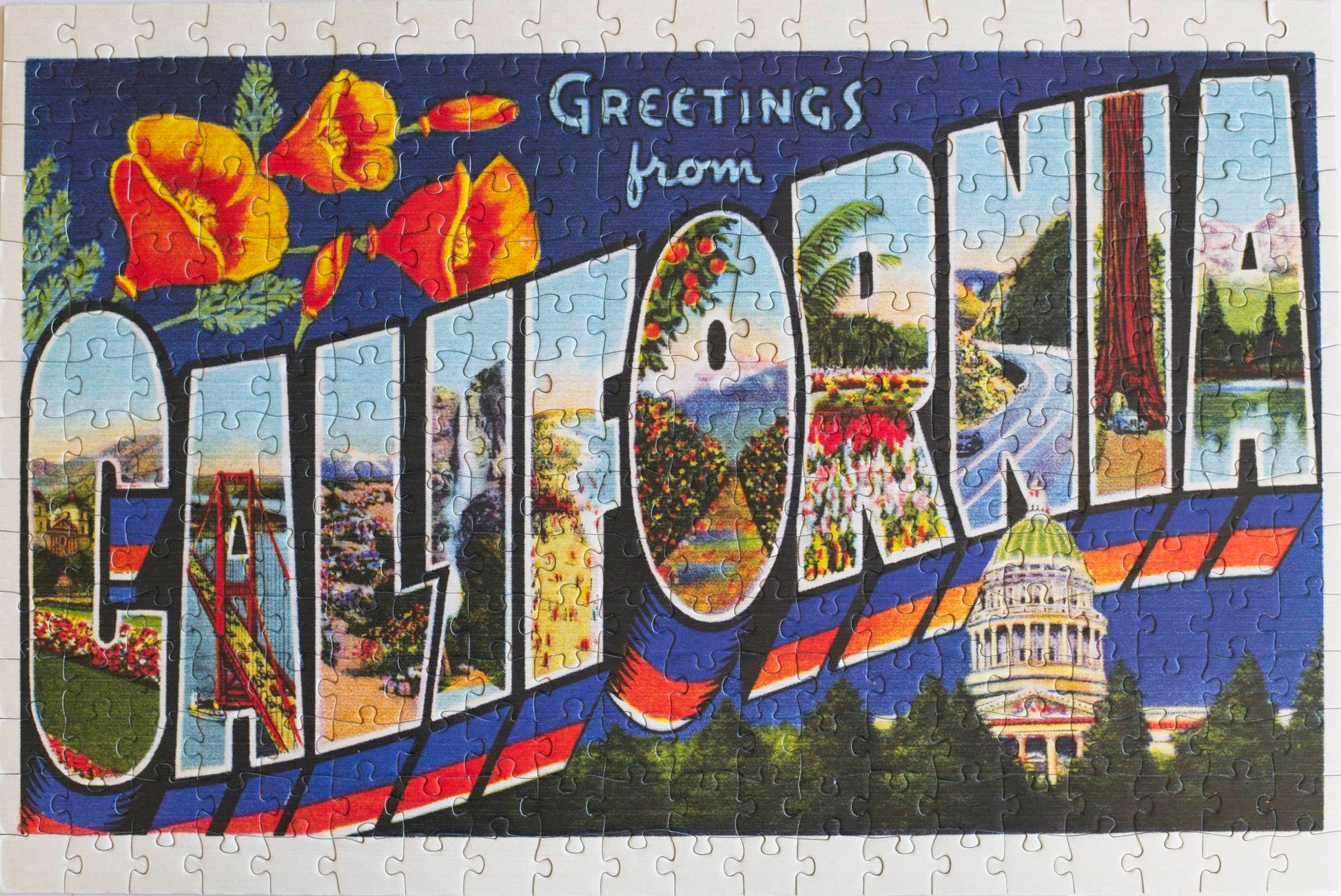 A colorful jgsaw puzzle with 300-pieces with a vintage postcard image that says Greetings from California