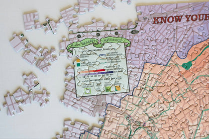 A close up of the partially completed puzzle showing the map key titled Lake Merritt today and Lake Merritt Circa 1850