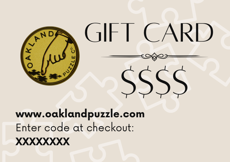 Oakland Puzzle Company e-gift card graphic with blank dollar amount, logo, website, and 'Enter code at checkout' text